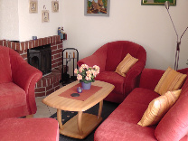 Wohnzimmer mit Kamin